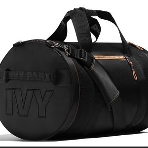 ivy park unisex convertible duffel bag in black.